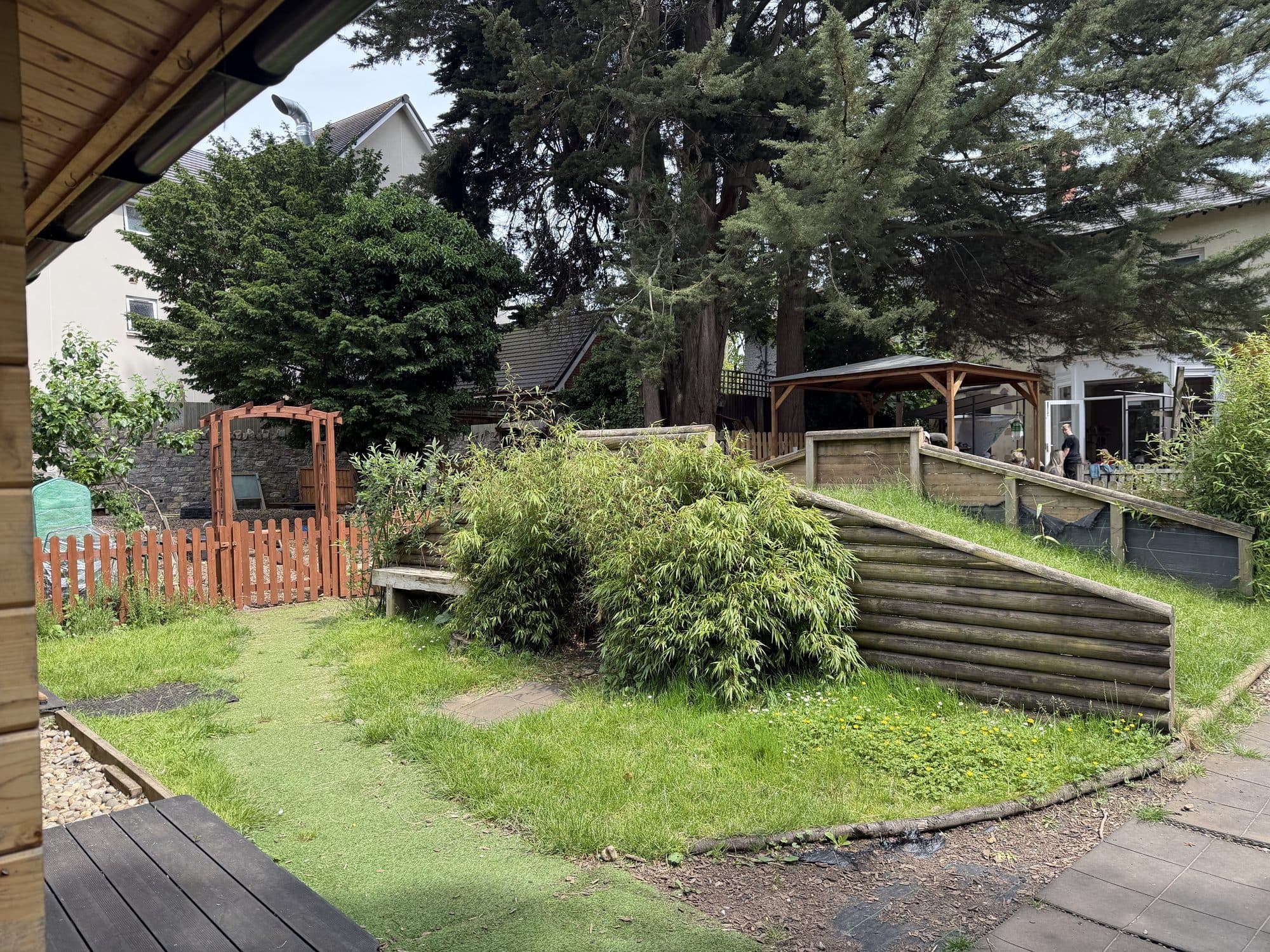 The garden, planting and lawn at The Manor House Nursery in Bristol